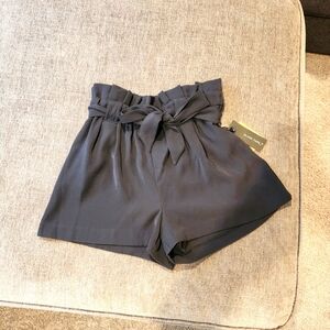 Paperbag shorts by Black Tape in Navy Blue. Size S